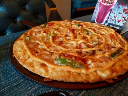 8.Tossin Pizza